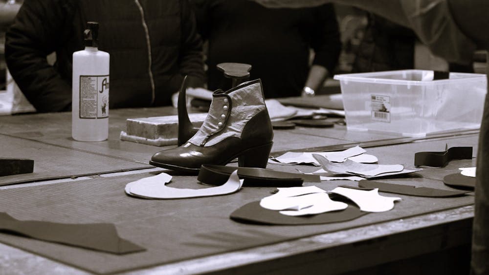 Alvira Button Boot on table during tour