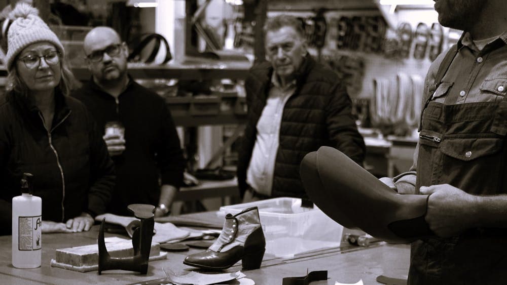 Bootmaker Jess talking through construction on tour