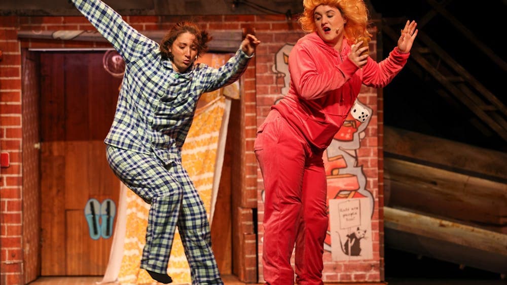 People in their pyjamas dancing