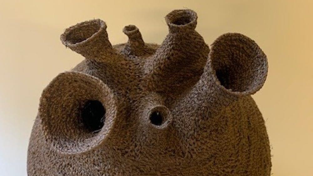 A weaving of natural materials into organic shapes