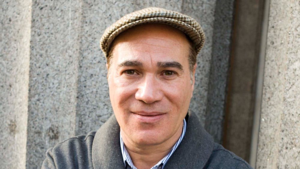 An image of Yuval smiling at the camera