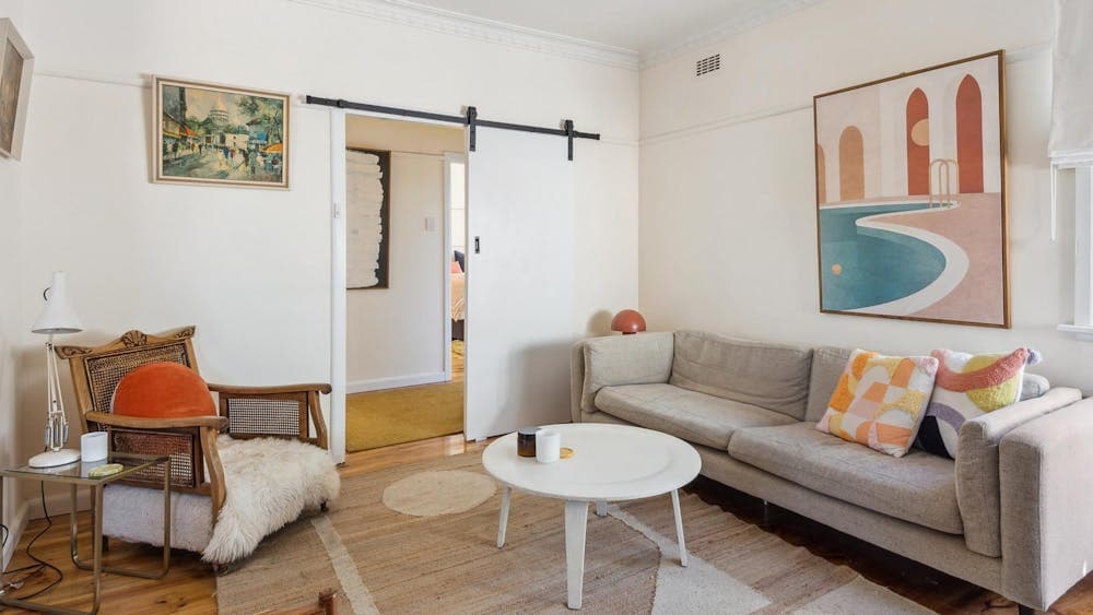 Lounge, chair, coffee table, paintings