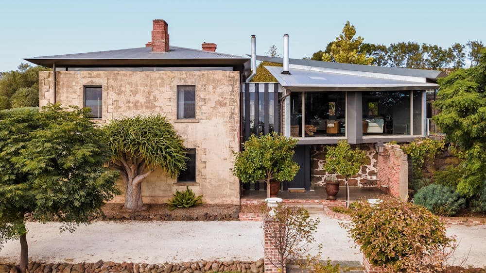 Enter though the double story entrance of Vale House house