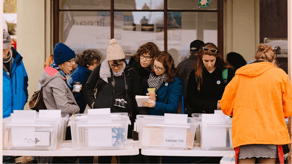 People purchasing books at the Clunes Booktown Festival