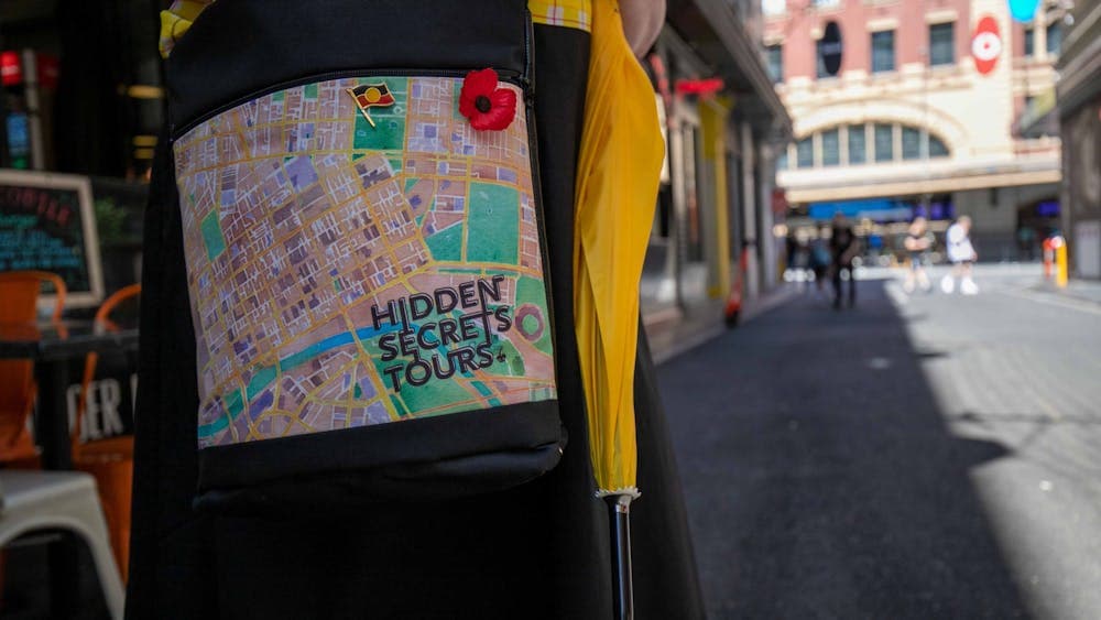 Our guides are easily recognizable with a distinct bag and yellow umbrella