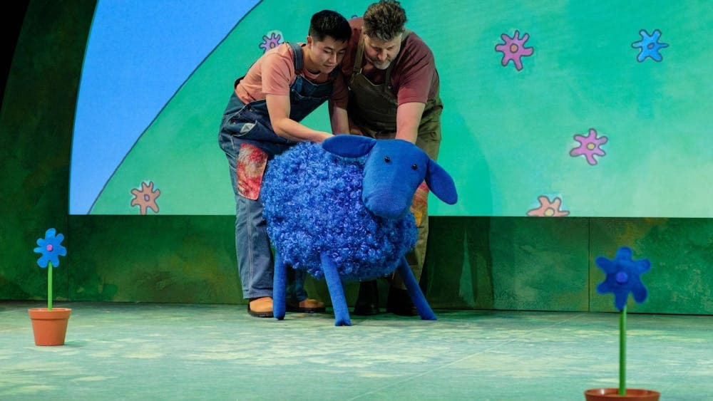 Puppeteers operating the White Sheep