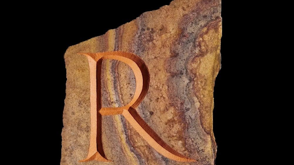 Hand carved letter R in stone