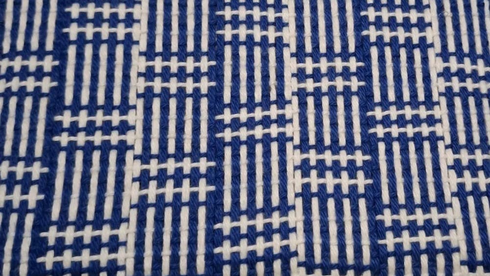 Blue and white woven fabric