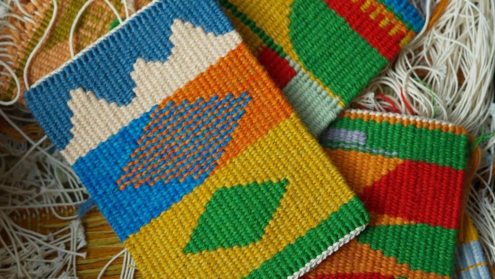 Three sets of colourful handwoven tapestry