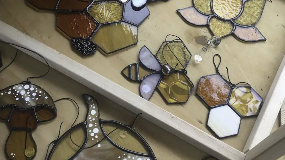 Stained glass panels on workbench