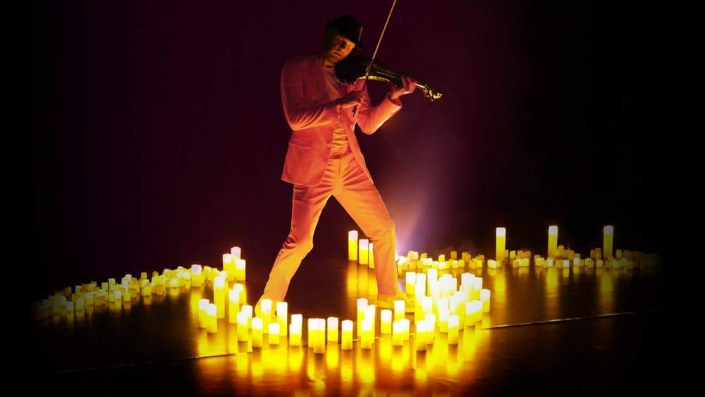 Violin Player by Candlelight