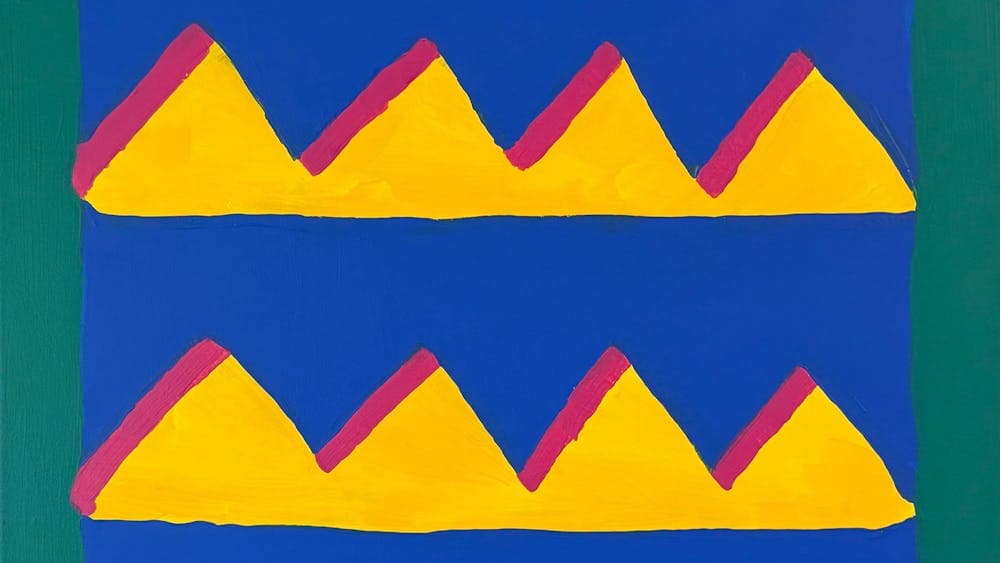 Pyramids in yellow against blue