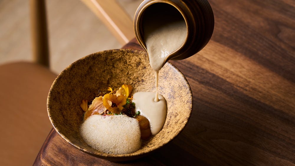 Soup with mushroom foam, Jerusalem artichoke crisps, caramelised onion and a chestnut puree