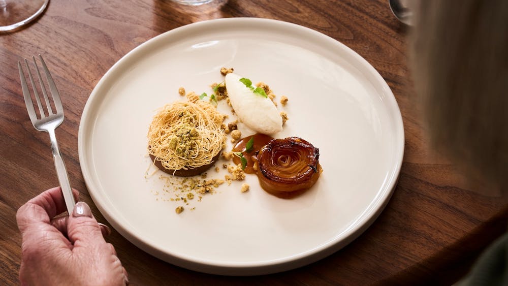 Harcourt pink lady apple, milk chocolate ganache, salted caramel, pistachios and cardamom ice cream