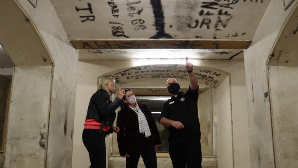 Staff pointing out features