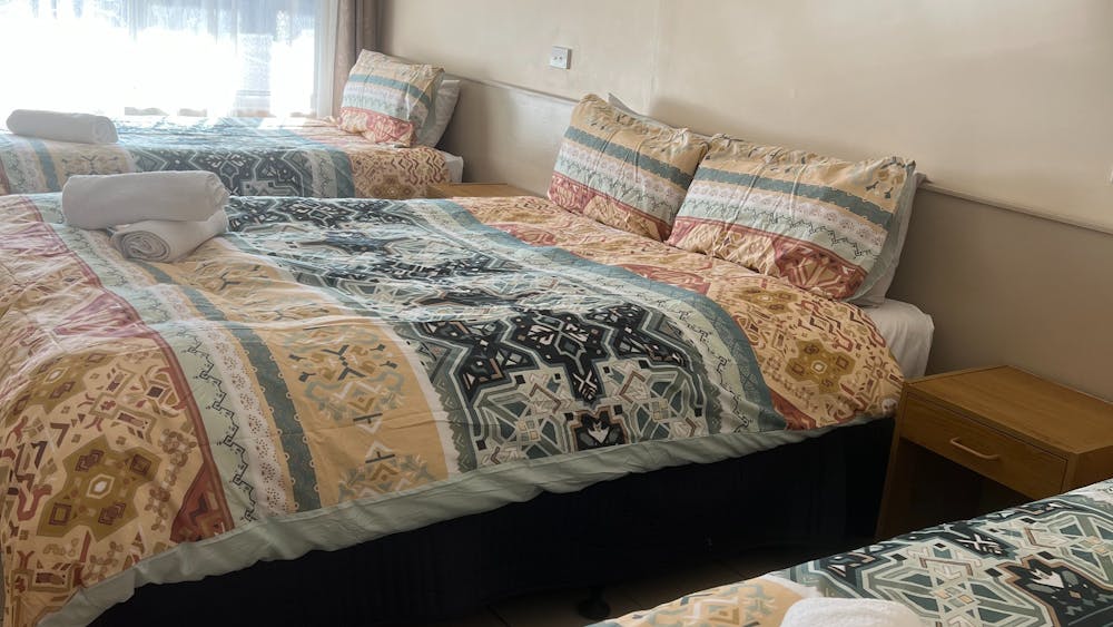 Queen  and 2 single Beds