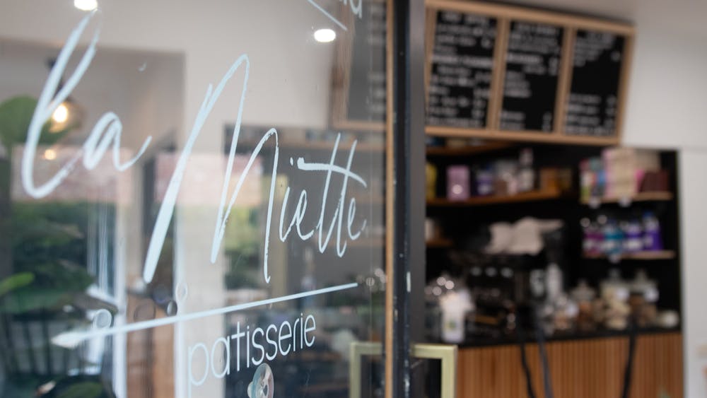 Front door of patisserie, welcoming customers. La Miette Patisserie, Ballarat cafes, coffee and cake