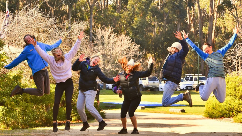 Winter Camp leaders jumping for joy