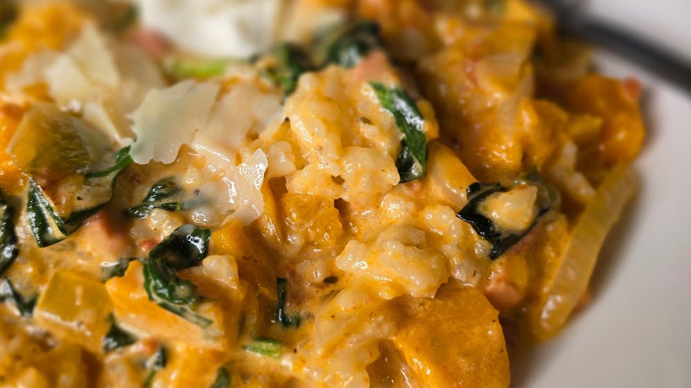 Creamy pumpkin and spinach risotto served with Meredith’s goats cheese.