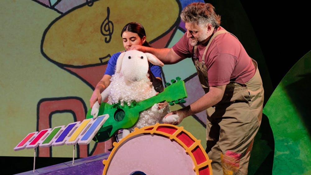 Puppeteers operating the White Sheep