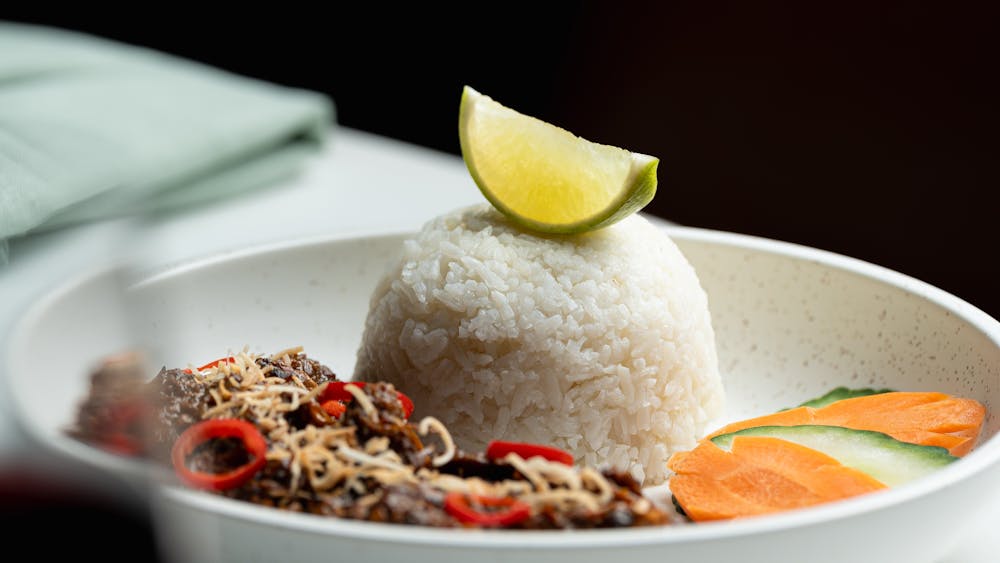 a tender beef cheek, marinated in traditional spices and expertly cooked to perfection