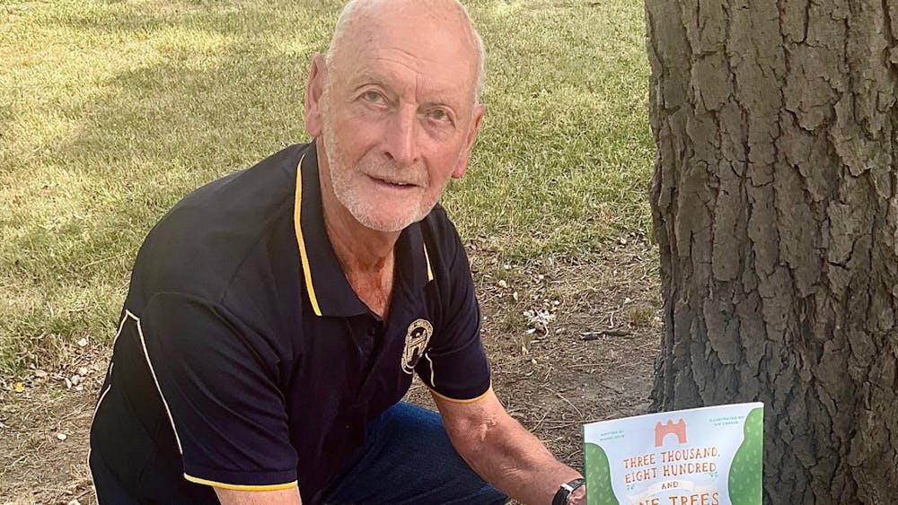 Speaker at the base of a tree from the Avenue of Honour