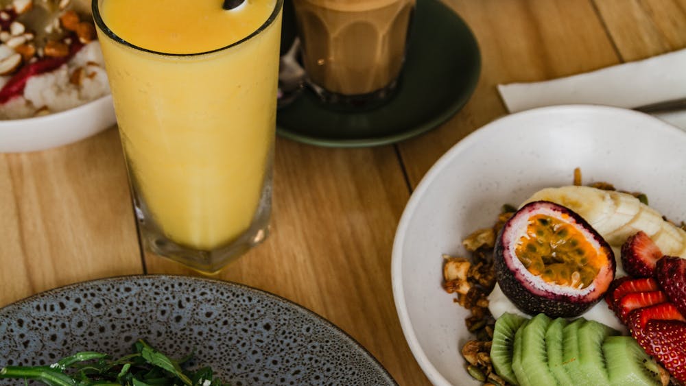 Breakfast  table with - Granola, Smoothies & Coffee