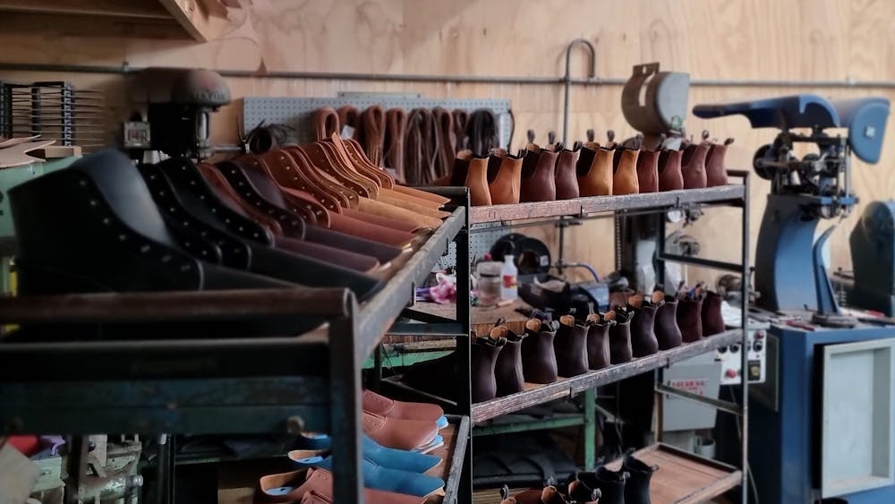 Boots and shoes on racks in production