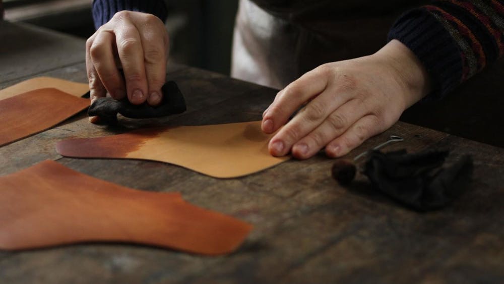 Hand dyeing leather