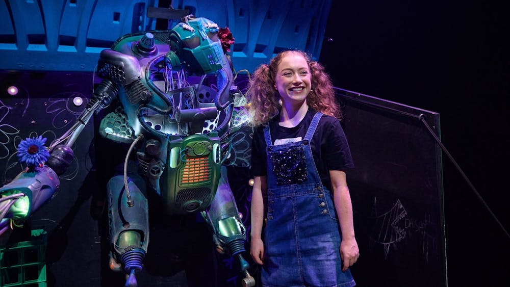 Juniper and her new best friend - a giant singing robot