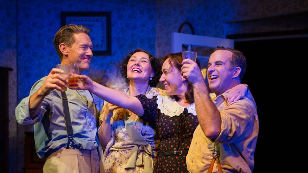 The main characters of The Doll Trilogy all raising their glasses