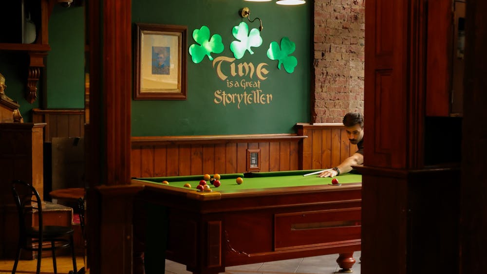 Young man playing pool