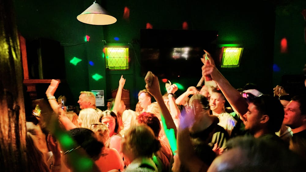 People dancing to a live band