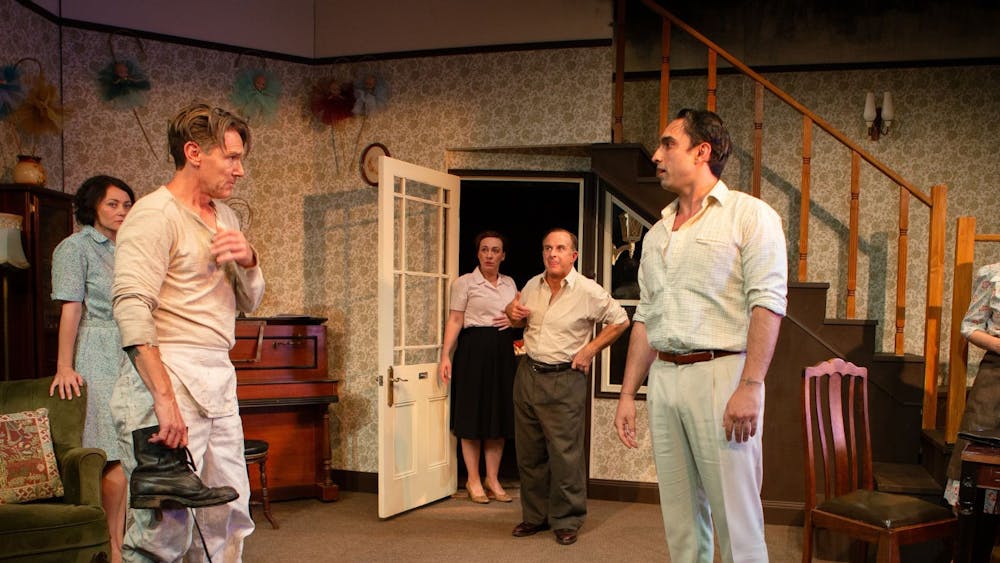 The cast of The Doll Trilogy in a tense standoff