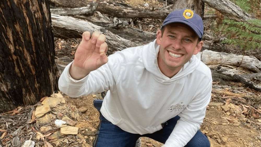 Participant holding a gold nugget discovered while exploring Victoria's goldfields.