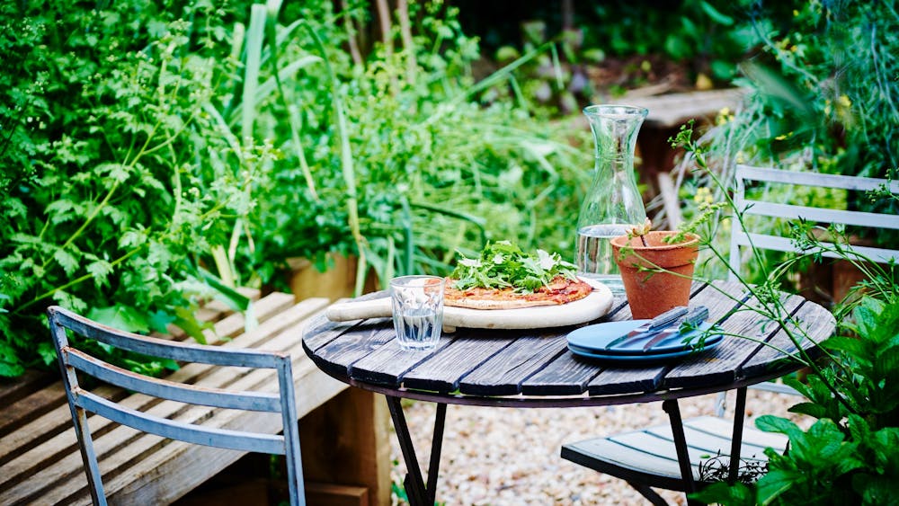 little kitchen garden thrives in the warmer months with all sorts of herbs, vegetables and flowers