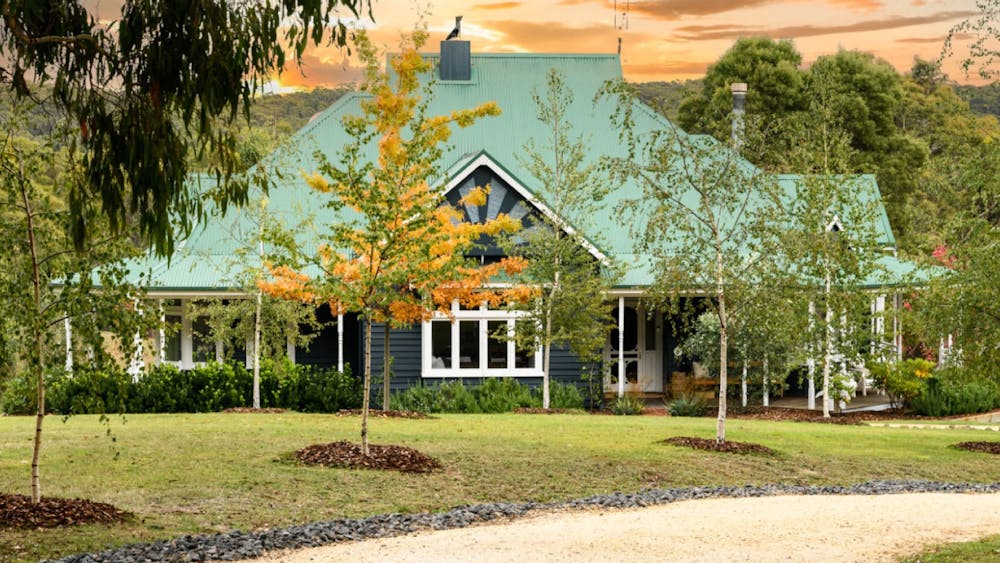 Photo of Bayleaf Country House through the trees