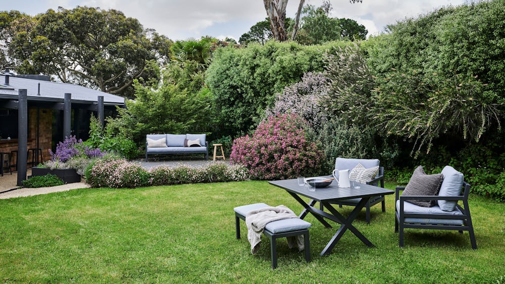 Jumoku Garden with an outdoor sofa, table and chairs