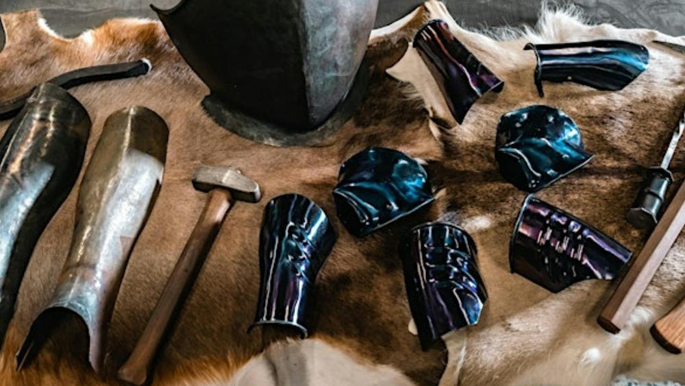 Armoury on display on animal skin on table